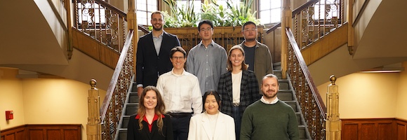 A photograph of Rebecca Ciez and graduate students